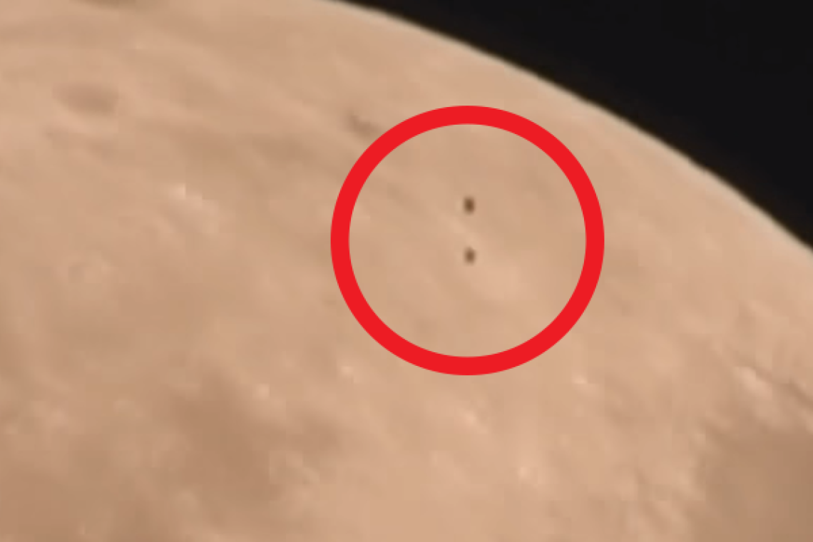 Two UFOs were captured in the Supermoon video, flying over the moon's surface.