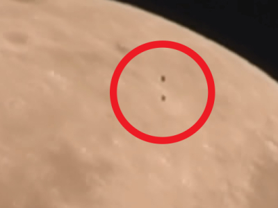 Two UFOs were captured in the Supermoon video, flying over the moon's surface.